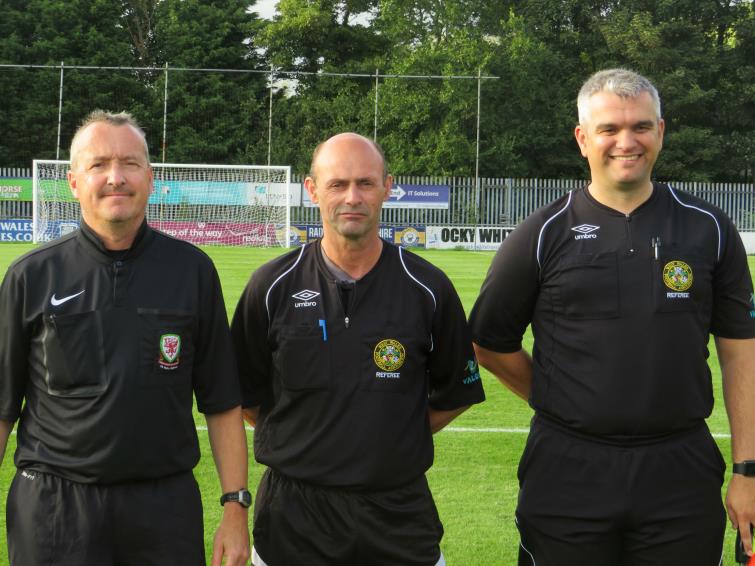 Match officials Angus Scourfield, Alan Boswell and Craig Templeton